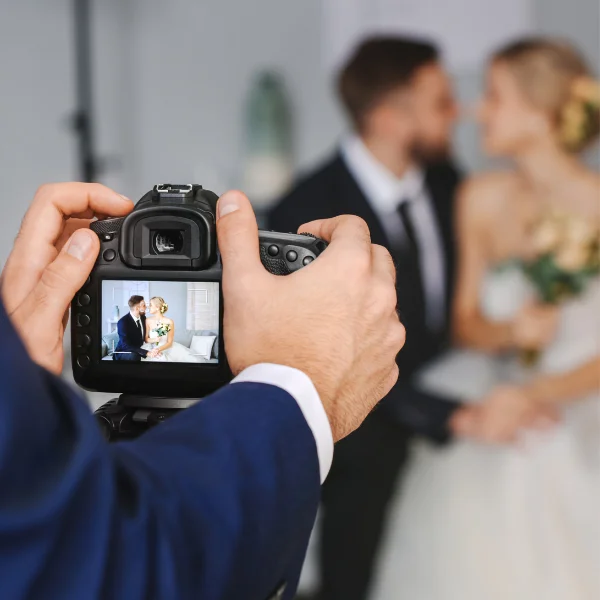 Image of a destination wedding photographer at work.